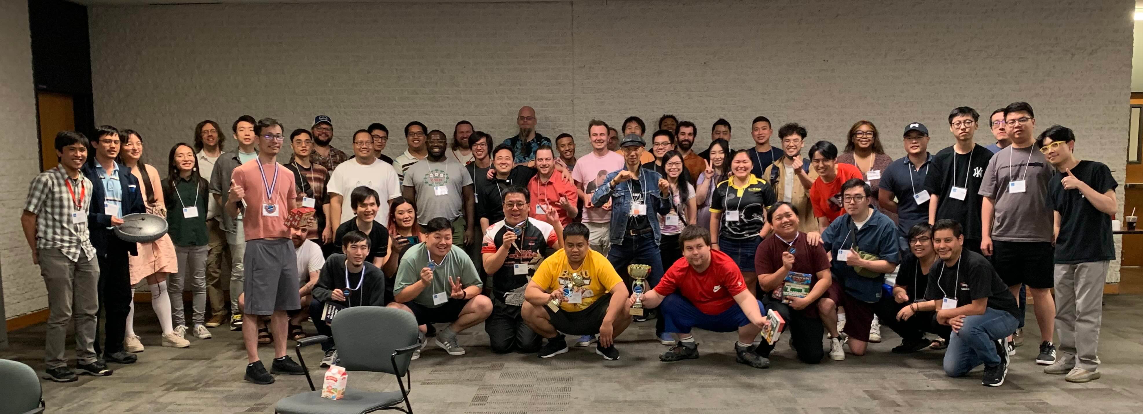 Group photo with the participants, staff and substitutes of the Toronto Riichi Open 2024. Prize winners show off their awards.